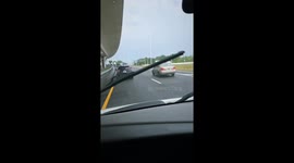 Bouncing tire spotted on moving vehicle in Tampa, Florida