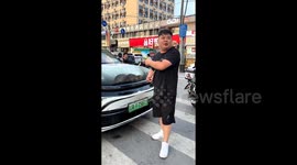 Chinese motorist turns car hood into fish tank: DIY aquarium sparks safety concerns