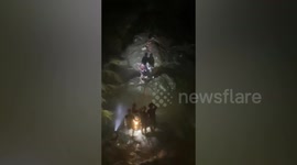 Hiker killed and three others rescued as flash flood hits waterfall