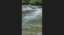 River Tubing Man Tips Over