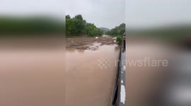 Spain: Cars Floating Down Cardener River After Heavy Storms Sweep Suria