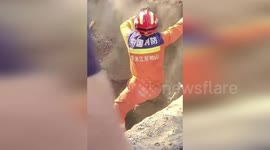 China: Firefighter Shields Trapped Worker From Deadly Collapse During Rescue In China