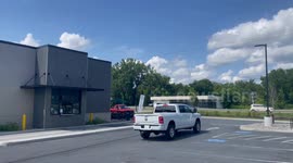 Trucks and cars in Starbucks Parking lot in Bennington Vermont