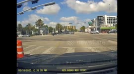 Scooter rider hit by red light runner in North Miami Beach, Florida, USA
