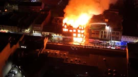 Footage shows shocking moment town centre building collapses in massive blaze