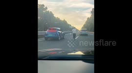 Motorists work together to catch young child who rode toy car onto highway in China