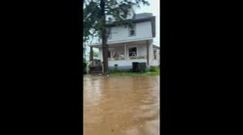 Flash flood overwhelms neighborhood during heavy rain in Plainfield, New York