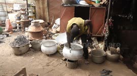 Senegal: Market in Senegal, Artisanal production of pans and pots