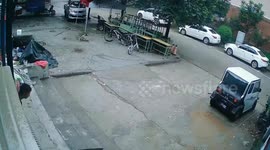 Workers lose control of cart as they carry it down ramp