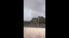 Sudden tropical downpour and winds sweep South Tampa, Florida