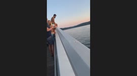 First date turns to near-death horror as man leaps off bridge—barely misses passing boat