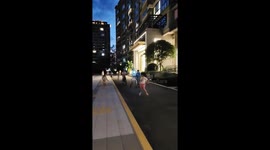 Children playfully run alongside robot companion in Sichuan, China