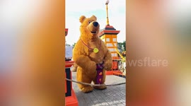 Awesome mascots dance with visitors at Thai theme park