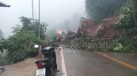Rockslide crashes onto mountain road as heavy rain hits northern Thailand