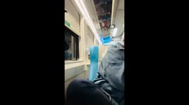 Passenger's face cut by glass shards when rock smashes through train window