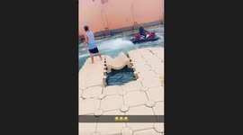 Boy gets unexpectedly drenched as water bike starts its splashing journey