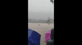Suspension bridge collapses during storm in the Philippines