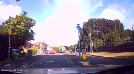 DASHCAM - Shocking Driving. Impatient White Vauxhall Crossland driver drives on wrong side of roundabout and on wrong side of road!