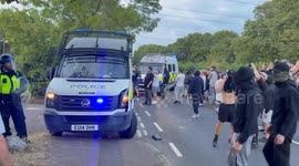 Protesters kick police vans as migrant hotel demonstration ends in violence
