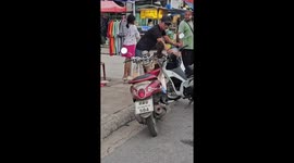 Motorcycle rider finds swarms of bees on his handlebars