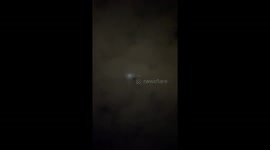 On the evening of July 10, 2025, a mysterious light phenomenon was captured above the skies of Shkodër, Albania. The footage shows a sequence of bright, pearl-like lights appearing above the clouds. At one moment, a light seems to separate and move indepe