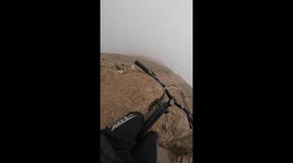Cyclist loses balance on rough slope in Chorrillos, Lima, Peru