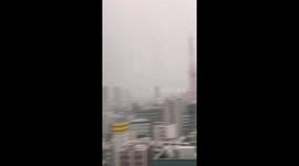Lightning strikes Tokyo Tower during storm in Minato, Tokyo, Japan