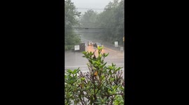 Flooding makes Chickatawbut Rd impassable in Braintree, Massachusetts, USA