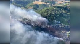 Italy: Wildfire Erupts In Calderino Hills As Fire Crews Battle Blaze And Evacuate Residents