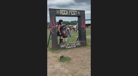 Four Fans Dressed as KISS Pose for Epic Photo at Rock Fest 2025 in Cadott Wisconson