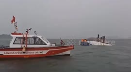 Rescue teams pull survivor from capsized boat in Vietnam