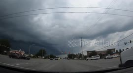 Dark shelf cloud and rain captured in time-lapse during drive in Orland Park, Illinois, USA