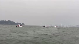 Vietnam capsized boat leaves dozens dead as storm batters region