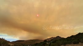 Wildfire smoke casts eerie sky over Cebreros, Ávila, Spain