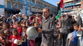 Displaced Palestinians protest hunger crisis with empty pots in Gaza Strip