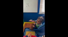 Young boy solves multiplication problem with confidence in Ohio, USA