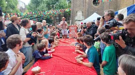 The spaghetti eating contest at this years Soho Fete held in Soho in the West End of London