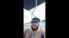Friend falls on shaking boat at Lake of the Ozarks in Missouri, USA