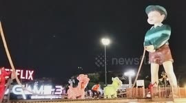 Chinese lions take a fall as they play Squid Game jump rope challenge