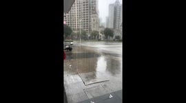 Empty refrigerator swept away by strong winds on street in Guangdong, China