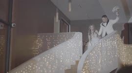 Newlywed husband botches entrance when he slips on stairway