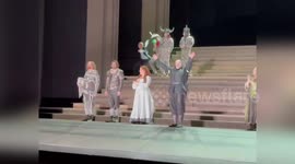 Performer raises Palestine flag during Royal Opera House curtain call