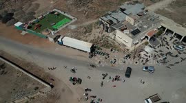 Syria: DRONE - Displaced families flee from Suwayda to Daraa amid intensifying clashes in Syria