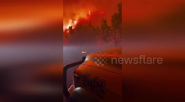 US: Red Flames Dance As Firefighters Work Near Paradox On Deer Creek Blaze