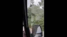 Roofs fly from buildings as Typhoon Wipha approaches Vietnam
