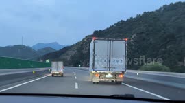 Unusual sight: Tiny delivery truck spotted alongside full-sized one in Hebei, China