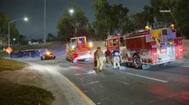 US, Los Angeles: Boyle Heights Overturned Semi-Truck Hauling Big Melons Blocks Transition Southbound 5 to Eastbound 10 Freeway