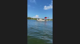 Florida woman stunned by houseboat with helicopter, sparks viral awe