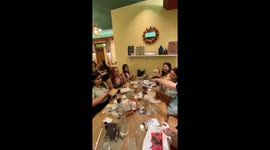 Best friends stunned by surprise pregnancy reveal at restaurant