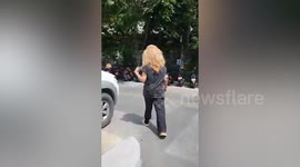 Female Thai dandy shows off her epic frizzy hairstyle
